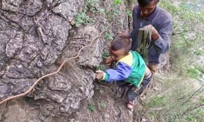 ​大凉山有个悬崖村与世隔绝，出入走崖壁爬藤梯，娶老婆比登天还难