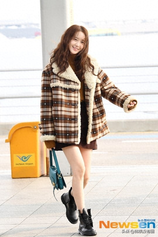 行走的人偶!少女时代林允儿飞往澳门,机场中的美貌引关注