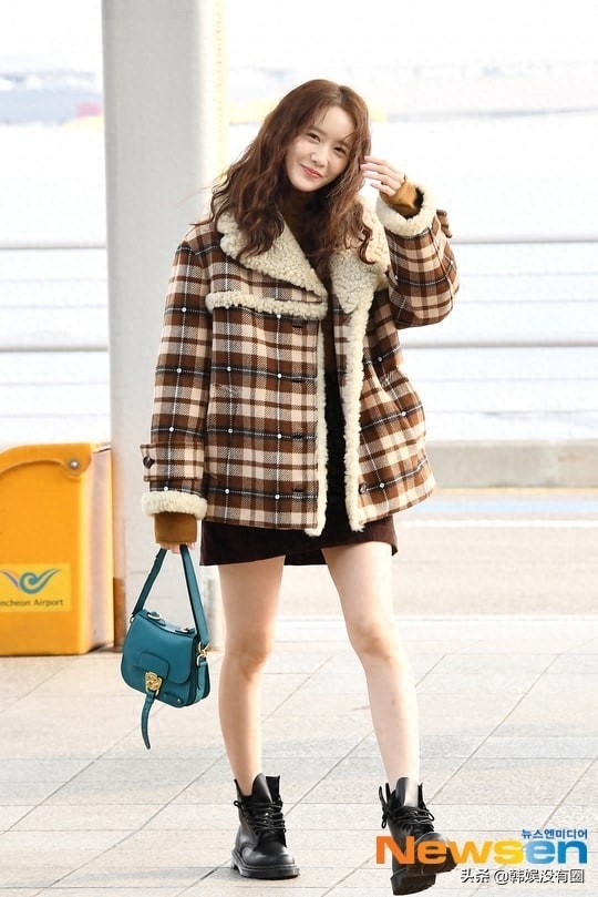 行走的人偶!少女时代林允儿飞往澳门,机场中的美貌引关注